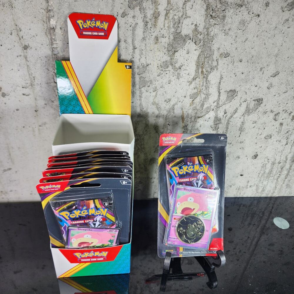 10x Pokemon TCG Mega Evolution Pitch Black Blister packs. Each have Slowpoke